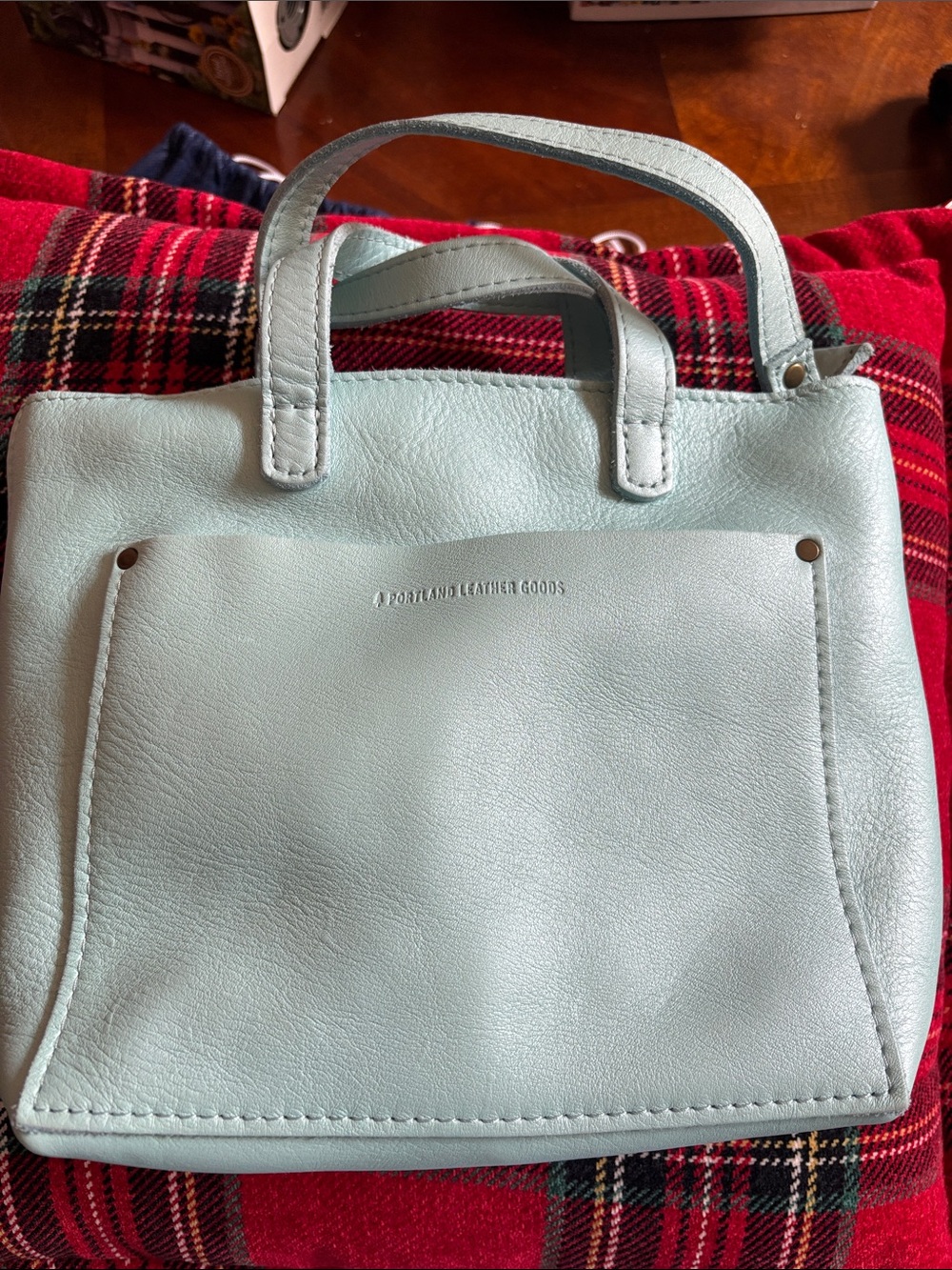 Portland Leather Cabo color (light blue with shimmer) mini zip crossbody